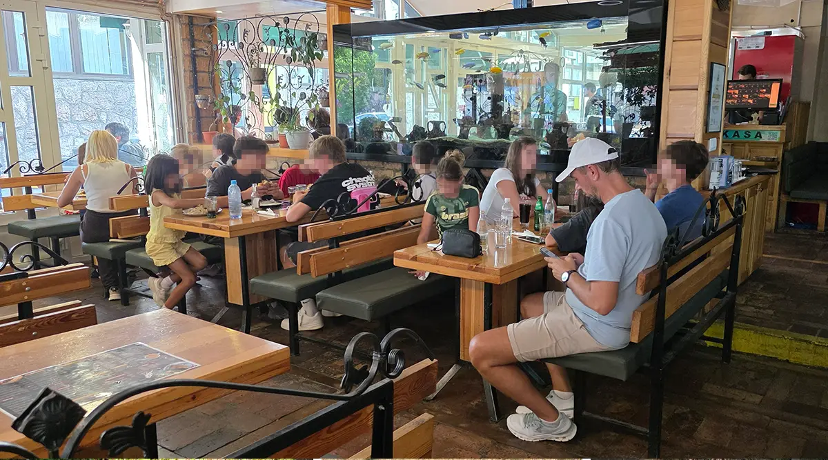 Children from Tuzla enjoying a meal in Sarajevo during their stay with Foundation Second