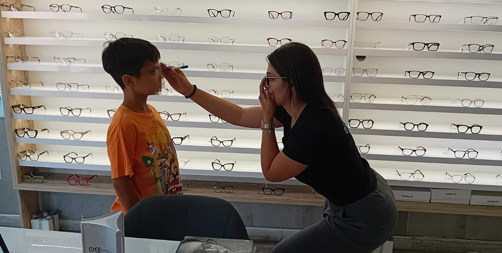Another boy from the Home receives a free eye exam and glasses thanks to Optical Gallery